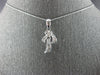 ESTATE .30CT DIAMOND 18K WHITE GOLD ROUND & BAGUETTE PALM TREE FLOATING PENDANT