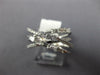.68CT DIAMOND 14KT WHITE GOLD 3D ROUND & BAGUETTE MULTI ROW CRISS CROSS FUN RING