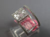 LARGE .76CT WHITE DIAMOND 18KT WHITE GOLD 3D ROUND & BAGUETTE ANNIVERSARY RING