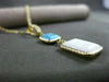 ESTATE .10CT DIAMOND TURQUOISE & WHITE QUARTZ 14KT YELLOW GOLD FLOATING PENDANT