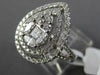 LARGE 18KT WHITE GOLD ENGAGEMENT RING. 3D CLUSTER PEAR SHAPE DOUBLE HALO DESIGN