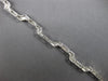 ESTATE .80CT DIAMOND 14KT WHITE GOLD ROUND GEOMETRICAL TRAPEZOID TENNIS BRACELET
