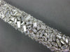 LARGE 13.86CT DIAMOND 18KT WHITE GOLD 3D CLUSTER GRADUATING CUFF TENNIS BRACELET