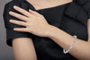 3.61CT DIAMOND 18K WHITE GOLD ROUND & BAGUETTE CLUSTER OVAL HALO TENNIS BRACELET
