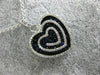 LARGE 1.69CT DIAMOND & AAA SAPPHIRE 18KT WHITE & BLACK GOLD MULTI HEART PENDANT
