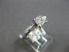 .50CT DIAMOND 18KT WHITE GOLD 3D PRINCESS & BAGUETTE INVISIBLE ENGAGEMENT RING
