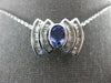 ESTATE 2.20CT DIAMOND & AAA TANZANITE 14K WHITE GOLD OVAL & BAGUETTE BOW PENDANT