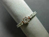 ESTATE .68CT DIAMOND 18KT WHITE & ROSE GOLD FLOWER TENNIS ETERNITY FLEXIBLE RING