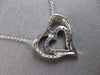 ESTATE .24CT DIAMOND 14KT WHITE GOLD CLASSIC DOUBLE HEART LOVE FLOATING PENDANT