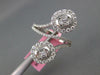 LARGE 1.06CT DIAMOND 18K WHITE GOLD ROUND & BAGUETTE INVISIBLE CRISS CROSS RING