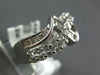 ESTATE WIDE 1.36CT DIAMOND 18KT WHITE GOLD ROUND & BAGUETTE CRISS CROSS FUN RING