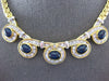 LARGE & LONG 16.0CT DIAMOND & AAA SAPPHIRE 18KT YELLOW GOLD LOVE KNOT NECKLACE