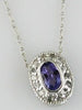 .32CT DIAMOND & AAA TANZANITE 14KT WHITE GOLD 3D OVAL & ROUND HALO BEZEL PENDANT