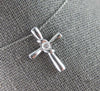 ESTATE .08CT DIAMOND 14KT WHITE GOLD 3D CLASSIC SOLITAIRE CROSS FLOATING PENDANT