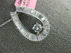 ESTATE 1.10CT DIAMOND 18KT WHITE GOLD ROUND & BAGUETTE HORSE SHOE LUCKY PENDANT