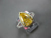 LARGE 2.68CT WHITE & FANCY YELLOW DIAMOND 18KT 2 TONE GOLD HALO ENGAGEMENT RING