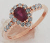 ESTATE .85CT DIAMOND & AAA RUBY 14KT ROSE GOLD ROUND & OVAL FRIENDSHIP LOVE RING