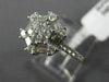 WIDE .89CT ROUND & BAGUETTE DIAMOND 18KT WHITE GOLD OCTAGON FLOWER CLUSTER RING