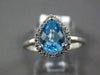 1.17CT DIAMOND & AAA BLUE TOPAZ 14K WHITE GOLD PEAR SHAPE & ROUND HALO LOVE RING