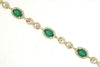 5.50CT DIAMOND & AAA EMERALD 14KT YELLOW GOLD OVAL & ROUND HALO TENNIS BRACELET