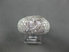 ESTATE 5.18CT ROUND & BAGUETTE DIAMOND 18K WHITE GOLD 3D INFINITY LOVE KNOT RING