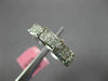 ESTATE .66CT DIAMOND 18KT WHITE GOLD ROUND & PRINCESS INVISIBLE ANNIVERSARY RING