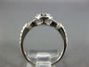 ESTATE WIDE .84CT DIAMOND 18KT WHITE GOLD CLUSTER LOVE KNOT FLOWER FUN RING