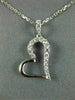 ESTATE .20CT DIAMOND 18KT WHITE GOLD 3D SIDEWAYS HEART FLOATING LOVE PENDANT