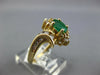 .68CT DIAMOND & AAA EMERALD 14KT YELLOW GOLD OVAL & ROUND FLOWER SWIRL FUN RING