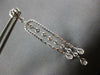 LONG 1.25CT DIAMOND 14KT WHITE GOLD ROUND & BAGUETTE HORSESHOE HANGING EARRINGS
