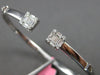 WIDE .72CT DIAMOND 18KT WHITE GOLD 3D ROUND & BAGUETTE FLEXIBLE BANGLE BRACELET