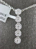 ESTATE 0.48CT DIAMOND 18KT WHITE GOLD MULTI FLOWER JOURNEY LOVE FLOATING PENDANT