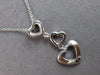 .06CT DIAMOND 14KT WHITE GOLD 3D OPEN HEART JOURNEY PAST PRESENT FUTURE PENDANT