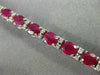 ESTATE WIDE 12.22CT DIAMOND & RUBY 18K WHITE GOLD CLASSIC OVAL TENNIS BRACELET
