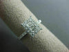 ESTATE .63CT ROUND & BAGUETTE DIAMOND 18KT WHITE GOLD RECTANGULAR PROMISE RING