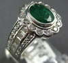 WIDE 2.19CT DIAMOND & EMERALD 18KT WHITE GOLD OVAL ROUND & BAGUETTE FLOWER RING