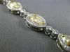 ESTATE LONG 6.23CT WHITE & FANCY YELLOW DIAMOND 18KT WHITE GOLD TENNIS BRACELET
