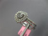 .95CT DIAMOND 18KT WHITE GOLD 3D HEART SHAPE & ROUND DOUBLE HALO ENGAGEMENT RING