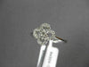 ANTIQUE SMALL .16CT DIAMOND 14KT WHITE GOLD FLORAL FOUR PETAL PAVE CLUSTER RING