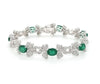LARGE 11.17CT DIAMOND & AAA EMERALD 18KT WHITE GOLD OVAL & ROUND TENNIS BRACELET