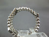 ESTATE .38CT DIAMOND 18KT WHITE GOLD FLOWER BEZEL BEADED ETERNITY STACKABLE RING