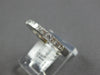 ESTATE .60CT DIAMOND 18KT WHITE GOLD PRINCESS CHANNEL INVISIBLE ANNIVERSARY RING