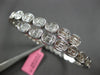 2.67CT DIAMOND 18K WHITE GOLD OVAL BEZEL INVISIBLE SEMI ETERNITY BANGLE BRACELET