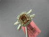 ESTATE 1.24CT WHITE & BROWNISH ORANGE DIAMOND 18KT WHITE & ROSE GOLD LOVE RING