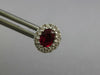 1CT DIAMOND & AAA RUBY 18KT WHITE GOLD OVAL & ROUND FLOWER CLASSIC STUD EARRINGS