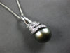 LARGE .07CT DIAMOND & AAA TAHITIAN PEARL 14KT WHITE GOLD SWIRL FLOATING PENDANT