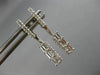 ESTATE .31CT ROUND & BAGUETTE DIAMOND 14KT WHITE GOLD ELONGATED HANGING EARRINGS