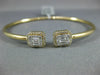 .79CT DIAMOND 18KT YELLOW GOLD ROUND & BAGUETTE CLUSTER FLEXIBLE BANGLE BRACELET