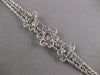 ESTATE LARGE 5.39CT DIAMOND 14KT WHITE GOLD CLUSTER MULTI FLOWER TENNIS BRACELET