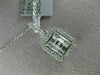 .49CT DIAMOND 18KT WHITE GOLD 3D ROUND & BAGUETTE SQUARE OCTAGON CLUSTER PENDANT